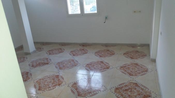 Maison au 1er etage d'une villa