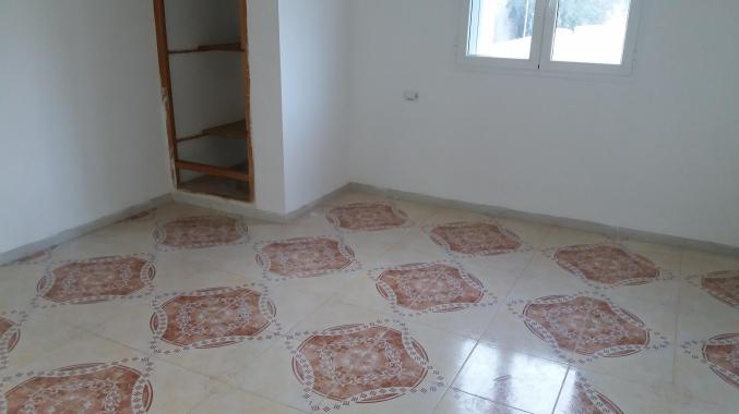 Maison au 1er etage d'une villa