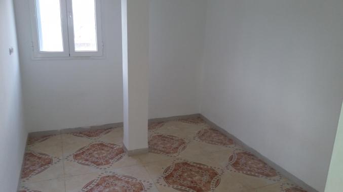 Maison au 1er etage d'une villa