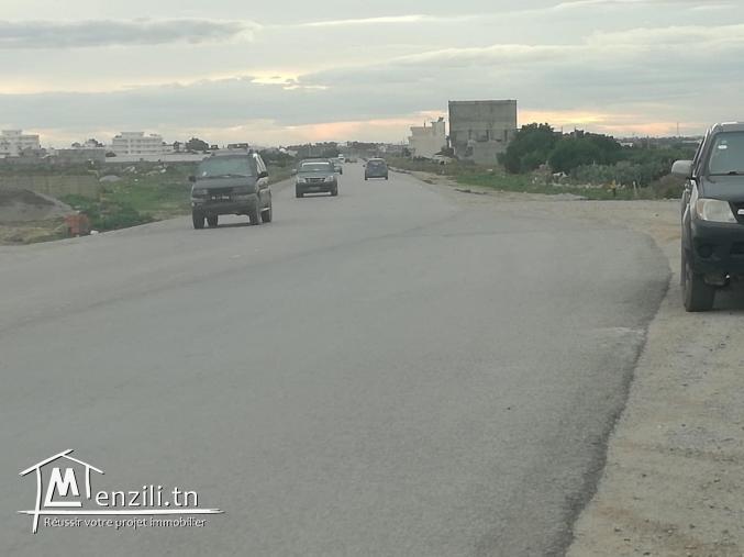 terrain en face salle couverte kelibia