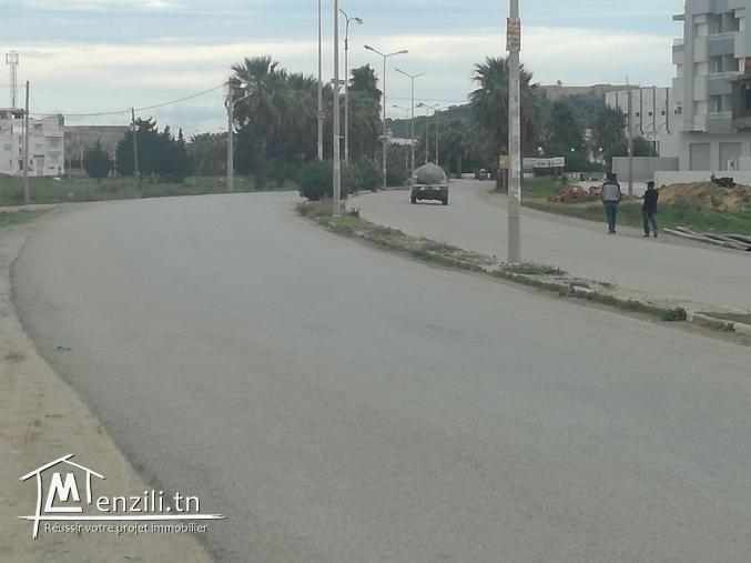 terrain en face salle couverte kelibia