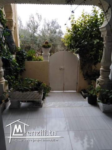 Une villa au rez-de-chaussée et deux appartements au 1 étage