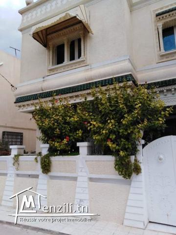 Une villa au rez-de-chaussée et deux appartements au 1 étage