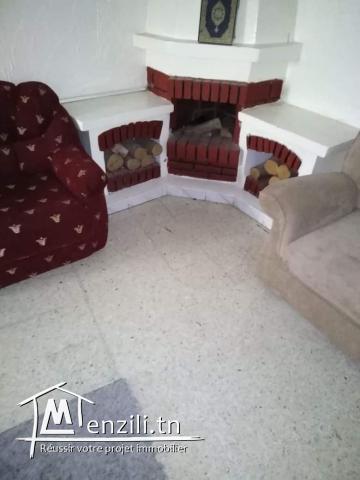 Une villa au rez-de-chaussée et deux appartements au 1 étage