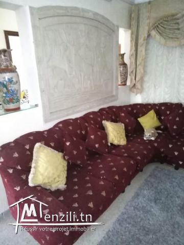 Une villa au rez-de-chaussée et deux appartements au 1 étage