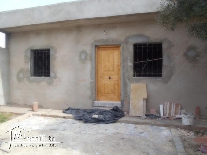 AV une belle maison avec jardin + garage  pas loin de yasmin hammamet   G