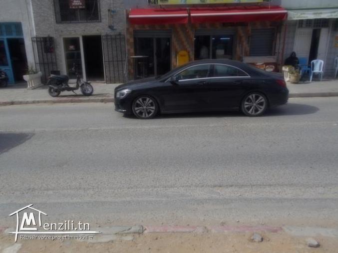 AV un fond commece a Hammamet