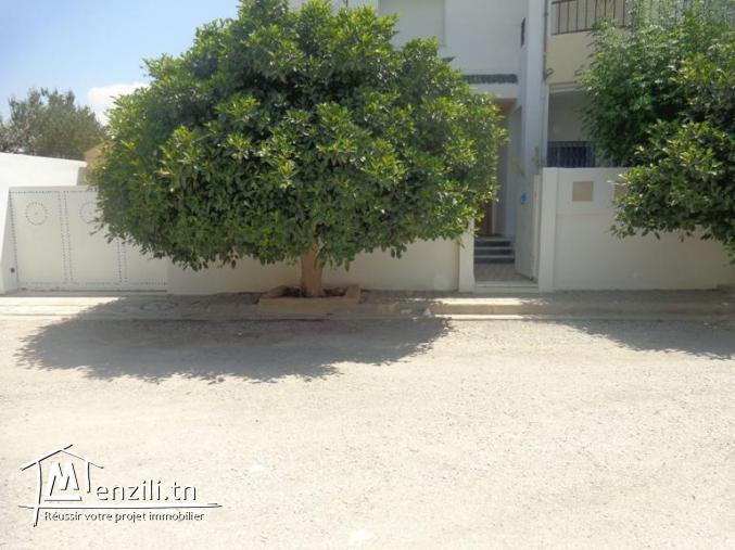 AV un appartement avrc jardin + garage  a mnaret hammamet  G