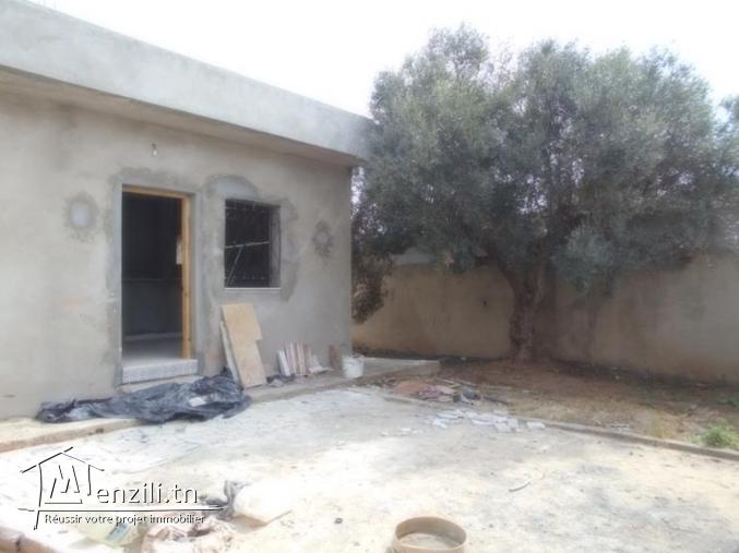 AV une maison avec jardin + garage  a hammamet sud  G