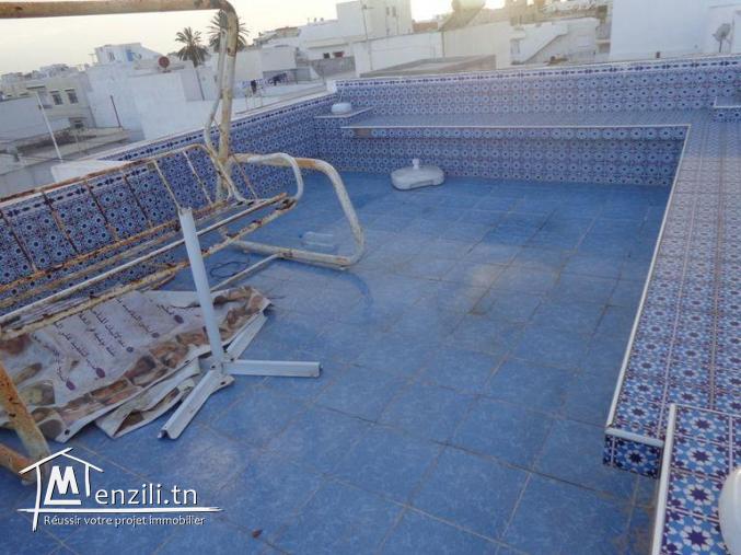 Plein centre ville hammamet nord un appartement a vendre  g