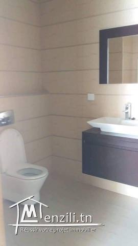 A vendre un S+2 situé à Avenue Hedi nouira Ennasr 2