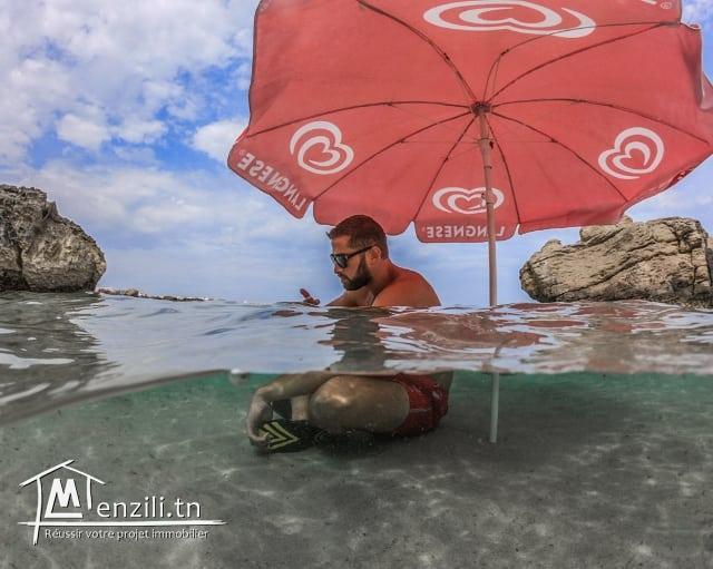 Terrain à kerkouen plage pied dans l'eau
