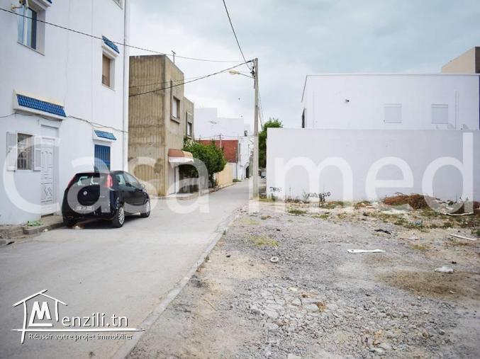 un lot de terrain à l bhar lazrek près de la soukra dans une zone résidentielle