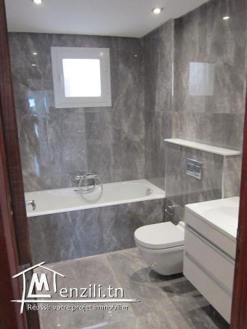 Apt S+2 à kantawi zone résidentielle dans une petite immeuble gardé