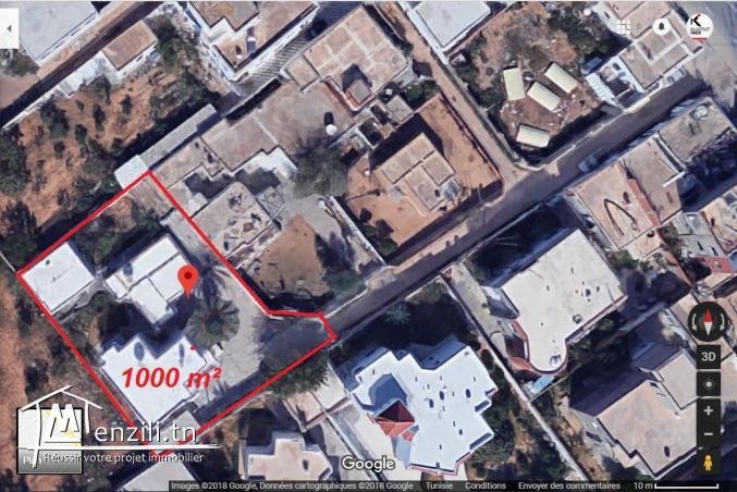 terrain avec 2 maison