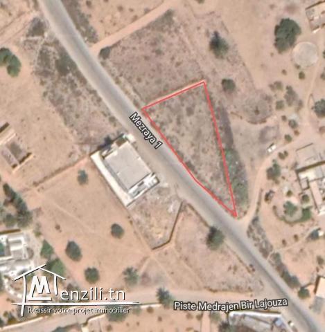 1050m2 titré + permis de bâtir