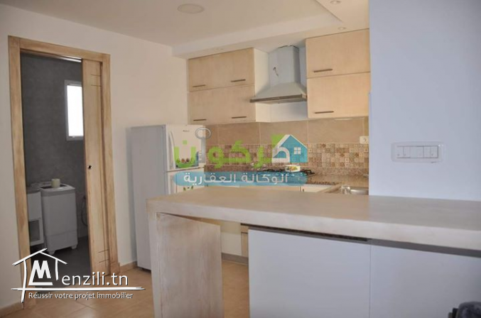 studio avec une belle vue sur mer