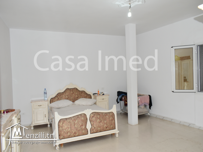 une maison et 6 locaux commerciaux a bardo