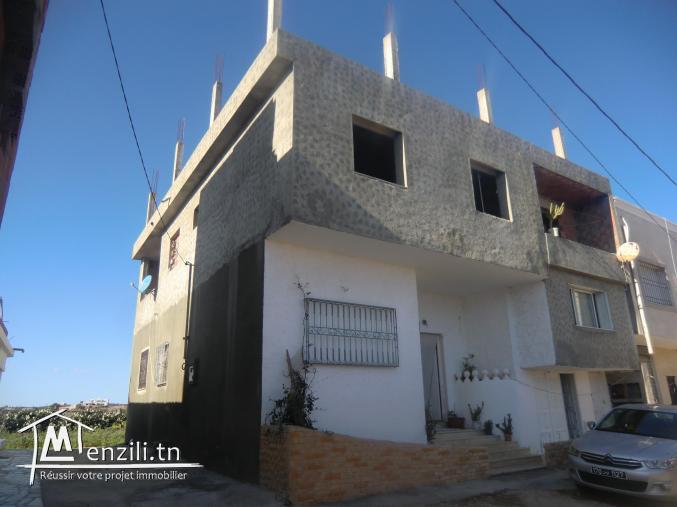 3 maisons et garage vu de mer