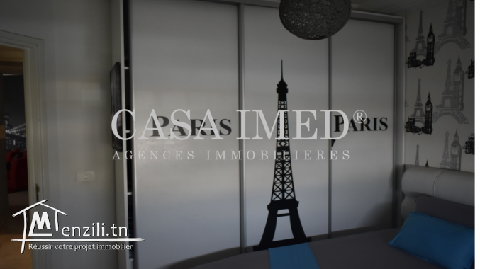 un appartement situé  à cité tahrir