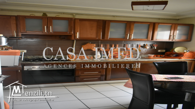 un appartement situé  à cité tahrir