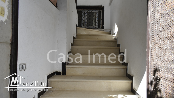 un immeuble  aux  jardins d’el menzah