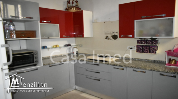 un immeuble  aux  jardins d’el menzah