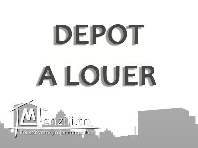 un dépôt couvert et en bon état à louer
