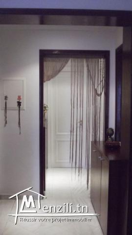 Salon et trois chambres