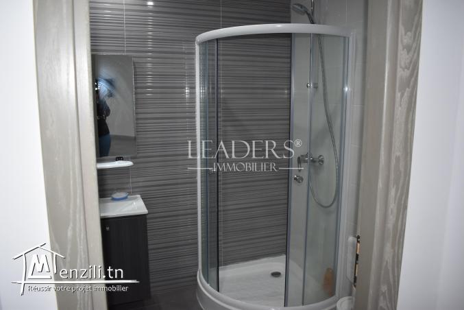 appartement s+1 avec jardin  occupe le RDC d’une  résidence gardée avec piscine