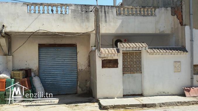 Maison(3 studiots et 2 garages)