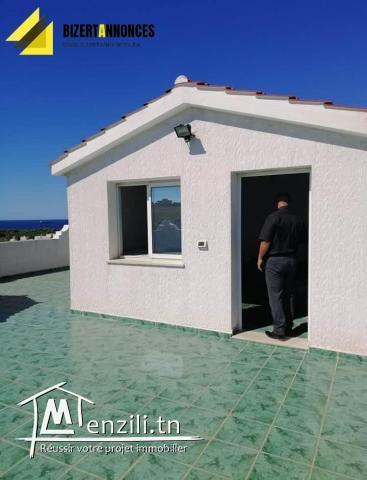 Un bâtiment à RIMEL PLAGE sur 3 niveaux avec garage