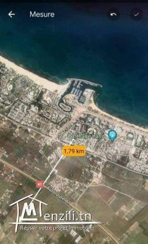 Terrain double façades sur la rue direct