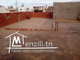 بيع أرض بها 2 منازل وحانوت تاكسيفون وحديقة خلفية