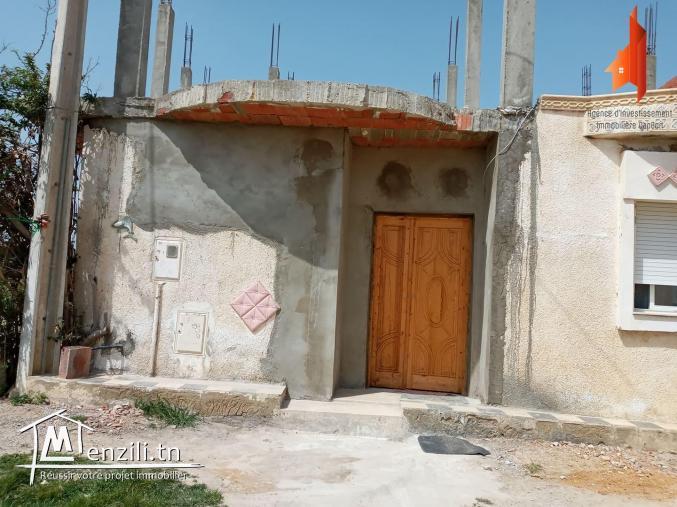 une maison avec studio  à cite " leksiba"