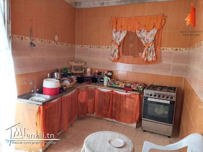 une maison avec studio  à cite " leksiba"