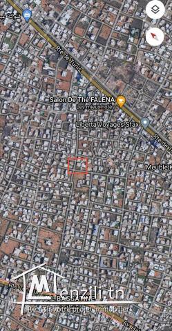 Grand terrain avec 2 maisons et 2 garages