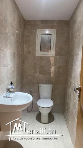 A louer s+2 haut standing avec place parking à cité el wahat aouina