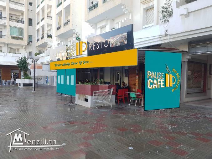 fond de commerce 100 sur une route principale vers entrée cite olympique Tunis