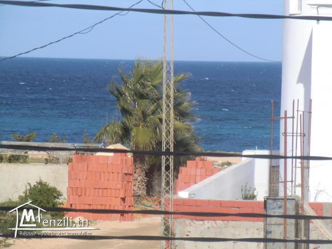 maison avec un studio et 1 ere etage innachevé