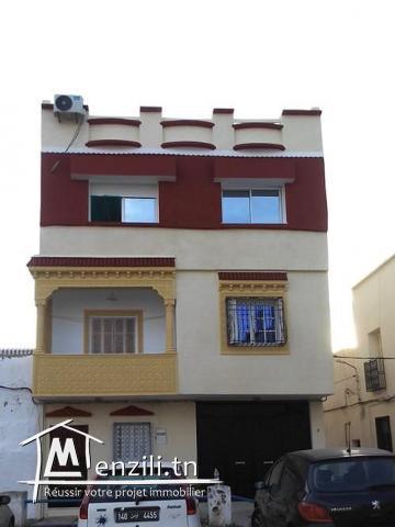 Bloc de deux appartements un garage et 2 studios