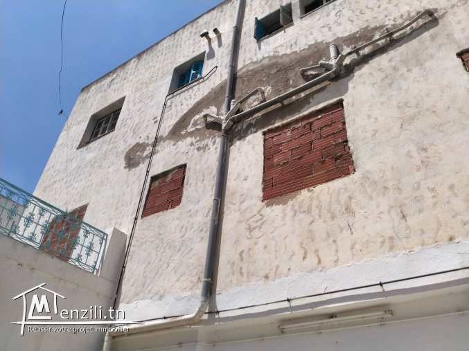 Immeuble 2 étages + Fond de commerce + Magazin