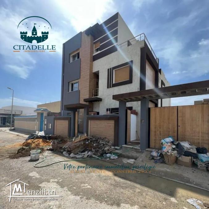 un appartement s+4 rdc avec garage situé à kélibia a vendre