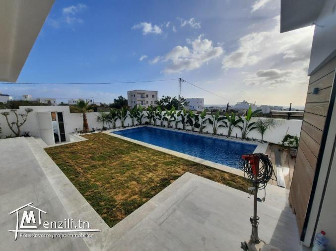 une belle villa avec une vue mer imprenable