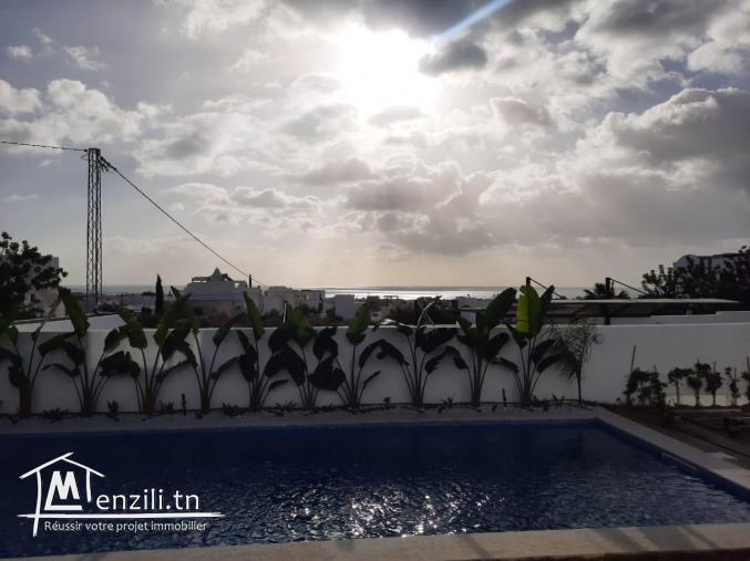 une belle villa avec une vue mer imprenable