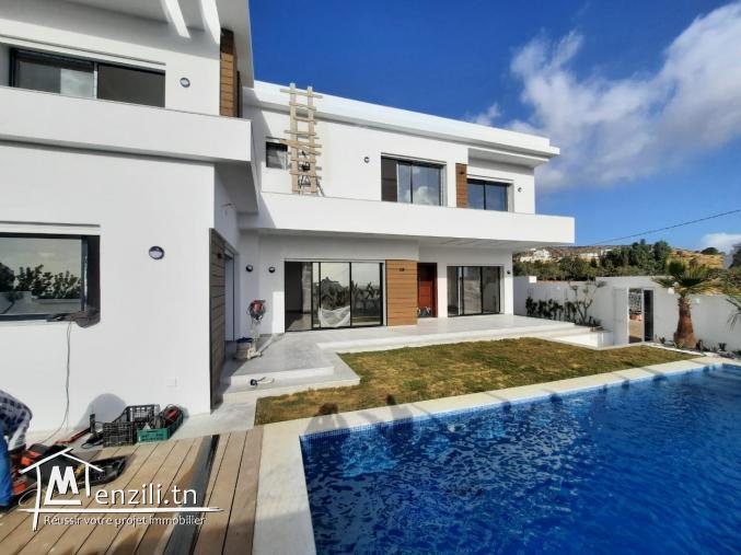 une belle villa avec une vue mer imprenable