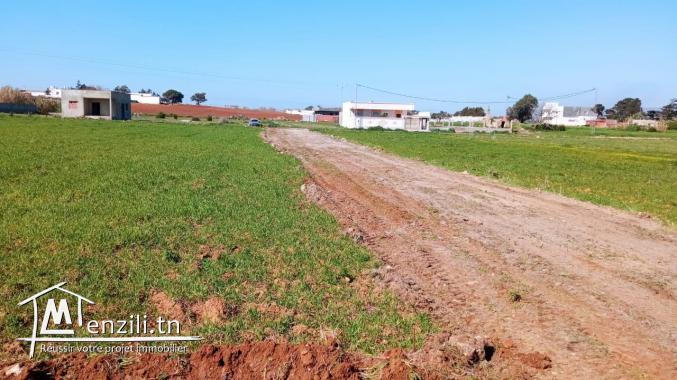 un terrain centre ville dar Allouche 5 min de la plage