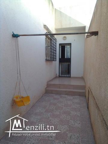 Un RDC avec jardin  a vendre