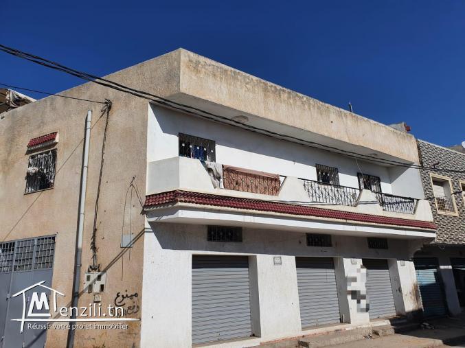 Appartement et garage commercial