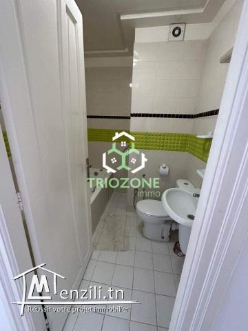 A vendre appartement s+2 spacieux avec place de parking sous sol à jardin de l'Aouina